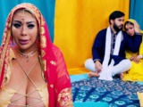A busty Indian woman fucks